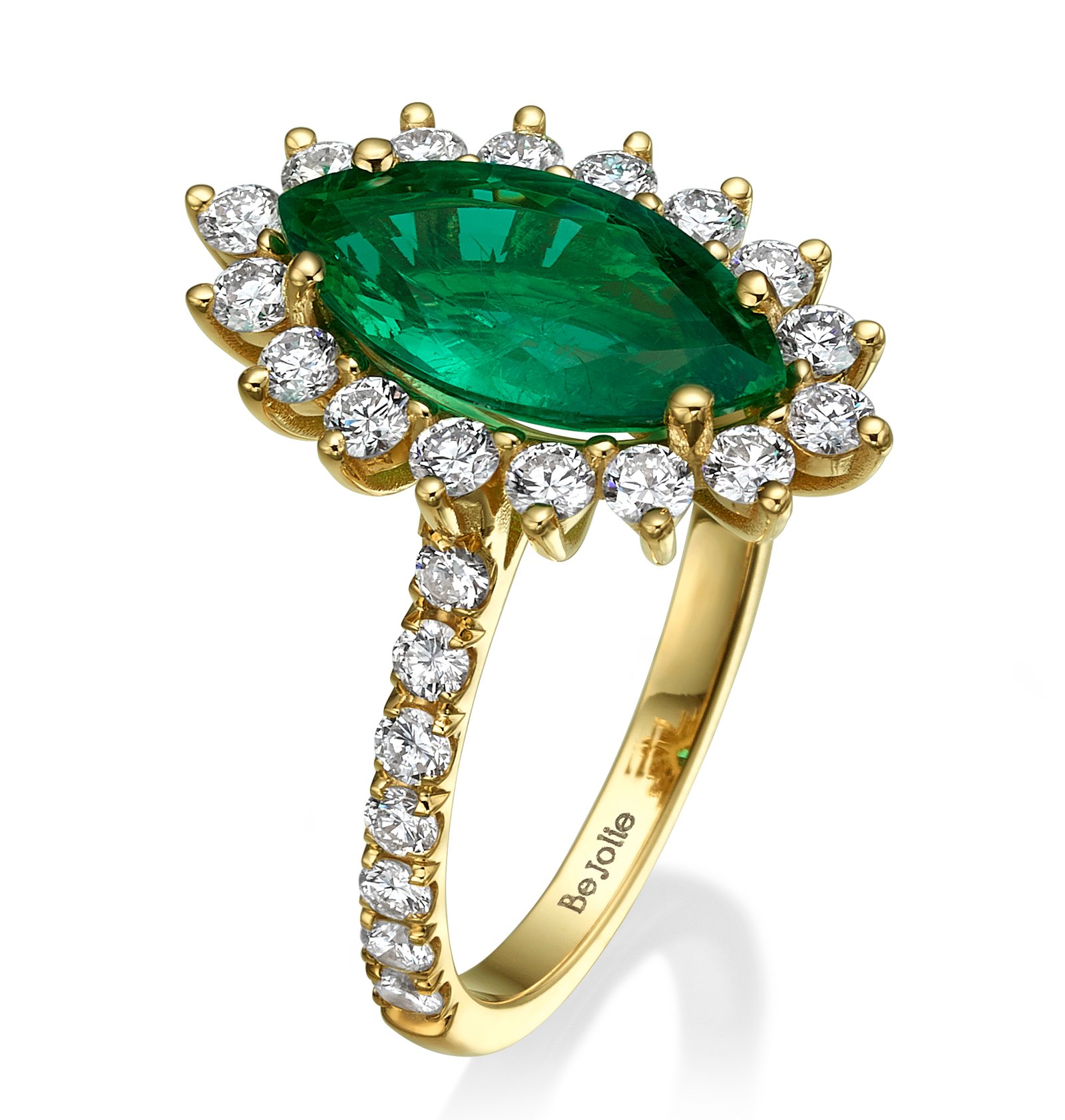 Ursula ring combining diamonds and green emerald. Ursula ring